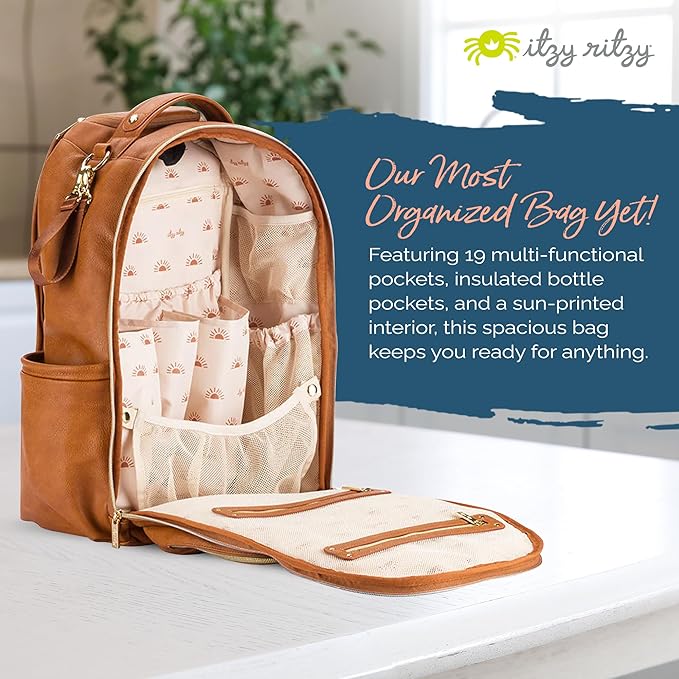 Itzy Ritzy Diaper Bag Backpack – Large Capacity Boss Plus Baby Backpack Diaper Bag Featuring 19 Pockets, Changing Pad, Stroller Clips, and Comfortable Straps (Cognac)