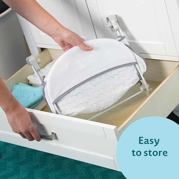 The First Years Sure Comfort Folding Baby Bather - Baby to Toddler Bath Tub - No-Slip Seat - for Sink or Tub Use
