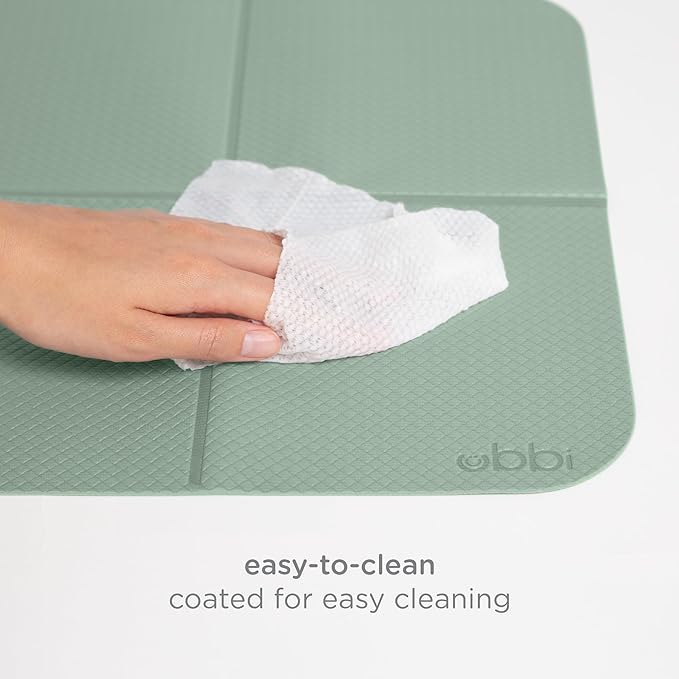 Ubbi On-The-Go Diaper Changing Baby Mat, Soft and Comfortable Diaper Bag Accessory Must Have for Newborns, Easy to Clean, Portable Folding Pad, Baby Traveling Accessories, Sage Green