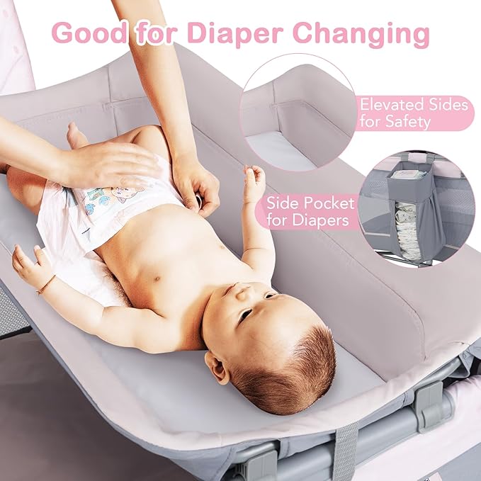 HONEY JOY Pack and Play with Bassinet, Infant Nursery Center Pack and Play w/Newborn Cradle & Hanging Toys, Diaper Storage, Music, Portable Baby Playard w/Changing Station (Starry Pink)