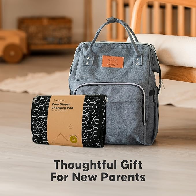 KeaBabies Portable Diaper Changing Pad - Large Waterproof Baby Changing Mat, Compact Travel Diaper Clutch, Functional Pockets Fit Newborn Essentials, Wipeable & Padded Baby Changer (Black Geo)