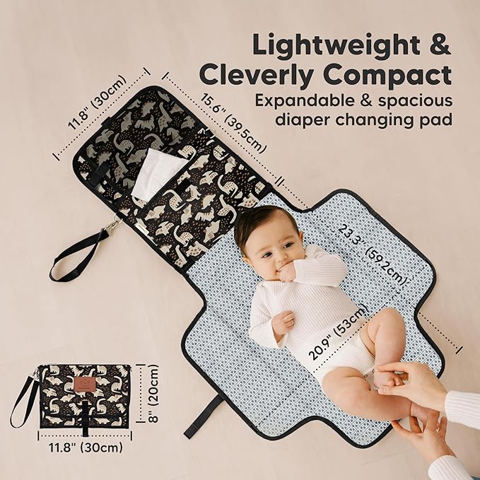 KeaBabies Portable Diaper Changing Pad - Large Waterproof Baby Changing Mat, Compact Travel Diaper Clutch, Functional Pockets Fit Newborn Essentials, Wipeable & Padded Baby Changer (Dino Ridge)