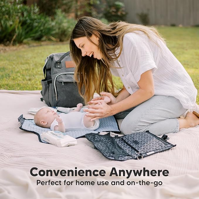 KeaBabies Portable Diaper Changing Pad - Large Waterproof Baby Changing Mat, Compact Travel Diaper Clutch, Functional Pockets Fit Newborn Essentials, Wipeable & Padded Baby Changer (Pixel)