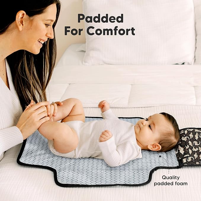 KeaBabies Portable Diaper Changing Pad - Large Waterproof Baby Changing Mat, Compact Travel Diaper Clutch, Functional Pockets Fit Newborn Essentials, Wipeable & Padded Baby Changer (Dino Ridge)