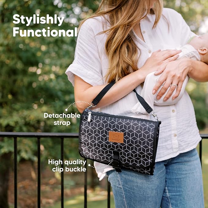 KeaBabies Portable Diaper Changing Pad - Large Waterproof Baby Changing Mat, Compact Travel Diaper Clutch, Functional Pockets Fit Newborn Essentials, Wipeable & Padded Baby Changer (Pixel)