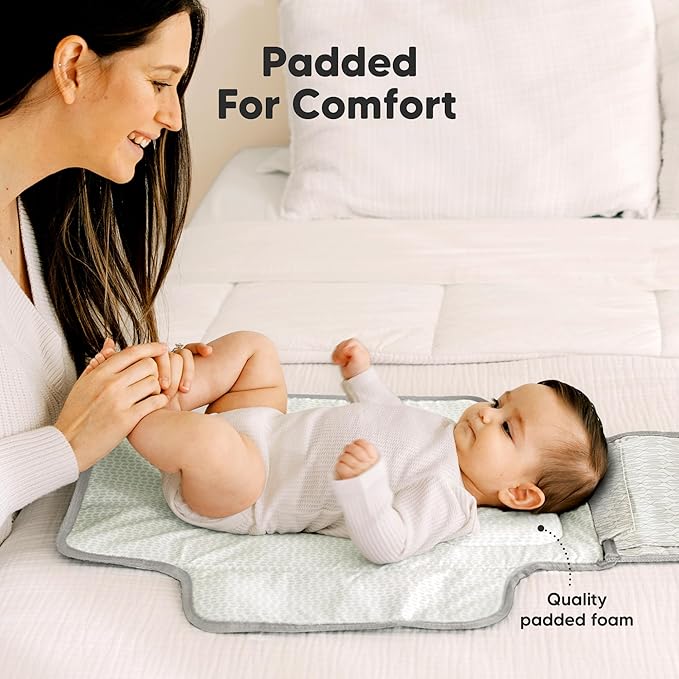 KeaBabies Portable Diaper Changing Pad - Large Waterproof Baby Changing Mat, Compact Travel Diaper Clutch, Functional Pockets Fit Newborn Essentials, Wipeable & Padded Baby Changer (Prism)