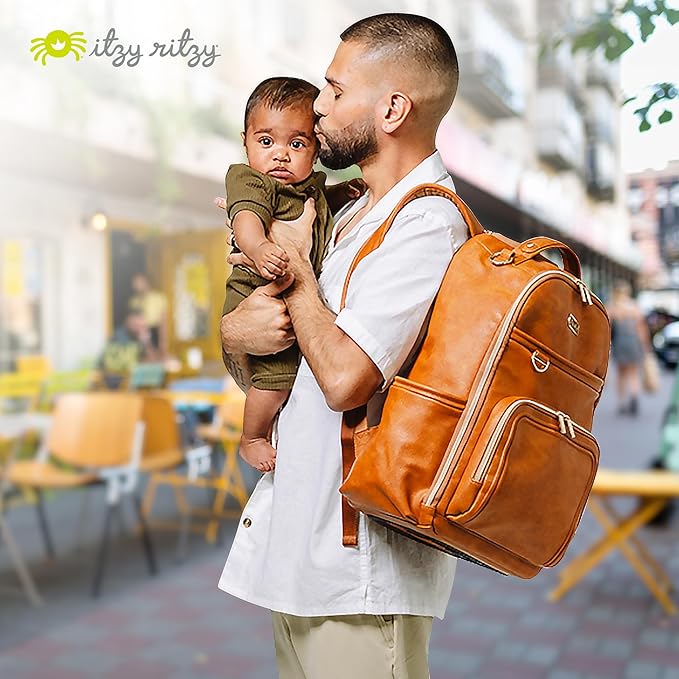 Itzy Ritzy Diaper Bag Backpack – Large Capacity Boss Plus Baby Backpack Diaper Bag Featuring 19 Pockets, Changing Pad, Stroller Clips, and Comfortable Straps (Cognac)