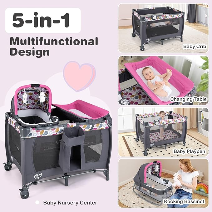 BABY JOY 5 in 1 Pink Pack and Play, Portable Baby Playard with Bassinet & Changing Table, Infant Pink Bassinet Nursery Center w/Toys & Music & Oxford Bag for Baby Girl Toddlers (Rose, Dot Circle)