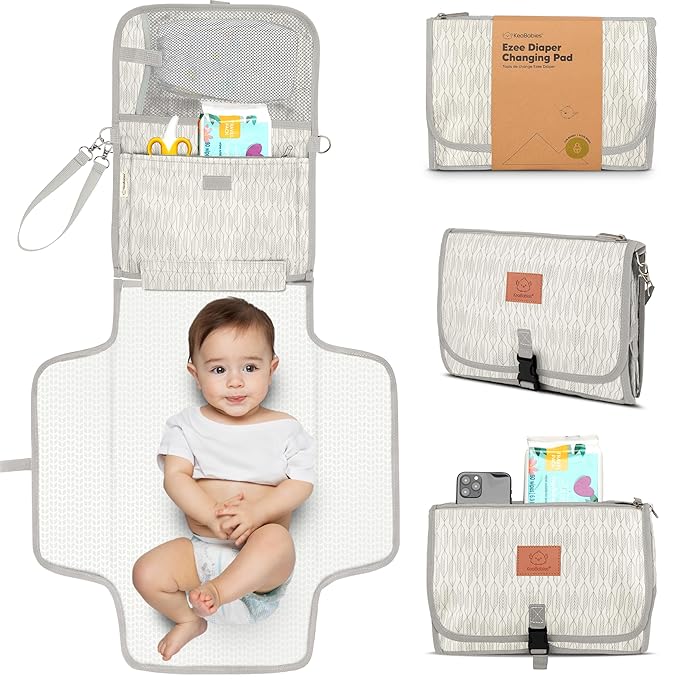 KeaBabies Portable Diaper Changing Pad - Large Waterproof Baby Changing Mat, Compact Travel Diaper Clutch, Functional Pockets Fit Newborn Essentials, Wipeable & Padded Baby Changer (Prism)